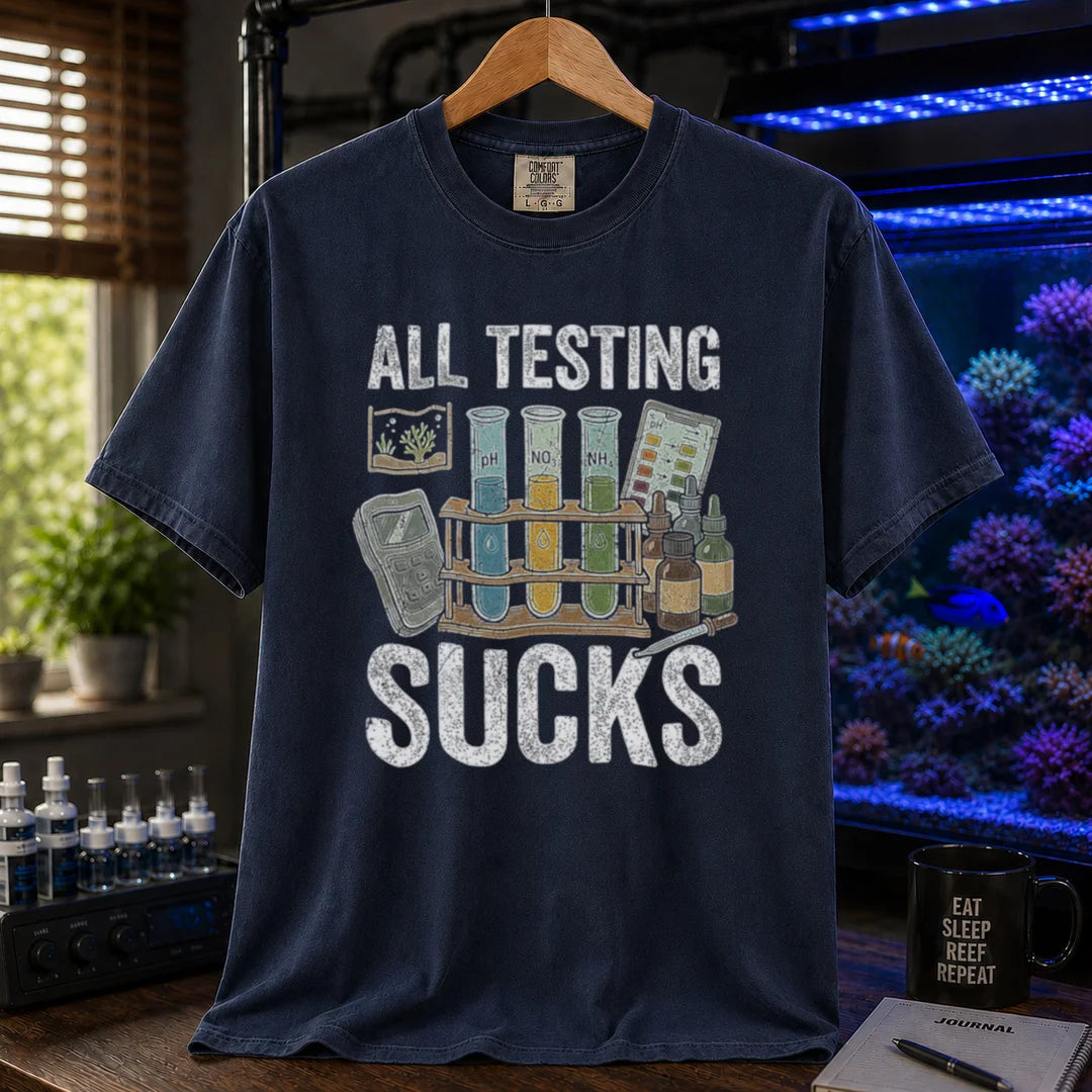 Saltwater aquarium graphic t-shirt featuring test tubes, reagent bottles, and text: ALL TESTING SUCKS, navy crew neck tee