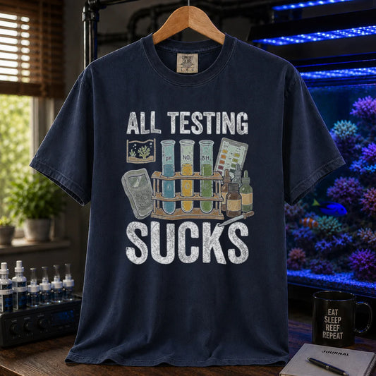 Saltwater aquarium graphic t-shirt featuring test tubes, reagent bottles, and text: ALL TESTING SUCKS, navy crew neck tee
