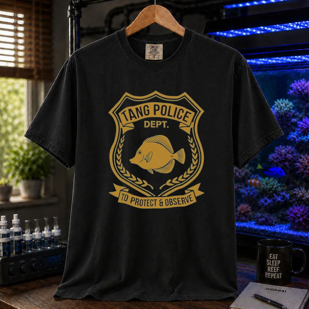 Saltwater aquarium graphic t-shirt featuring a gold police badge with a tang fish and text: TANG POLICE DEPT. TO PROTECT & OBSERVE, black crew neck tee