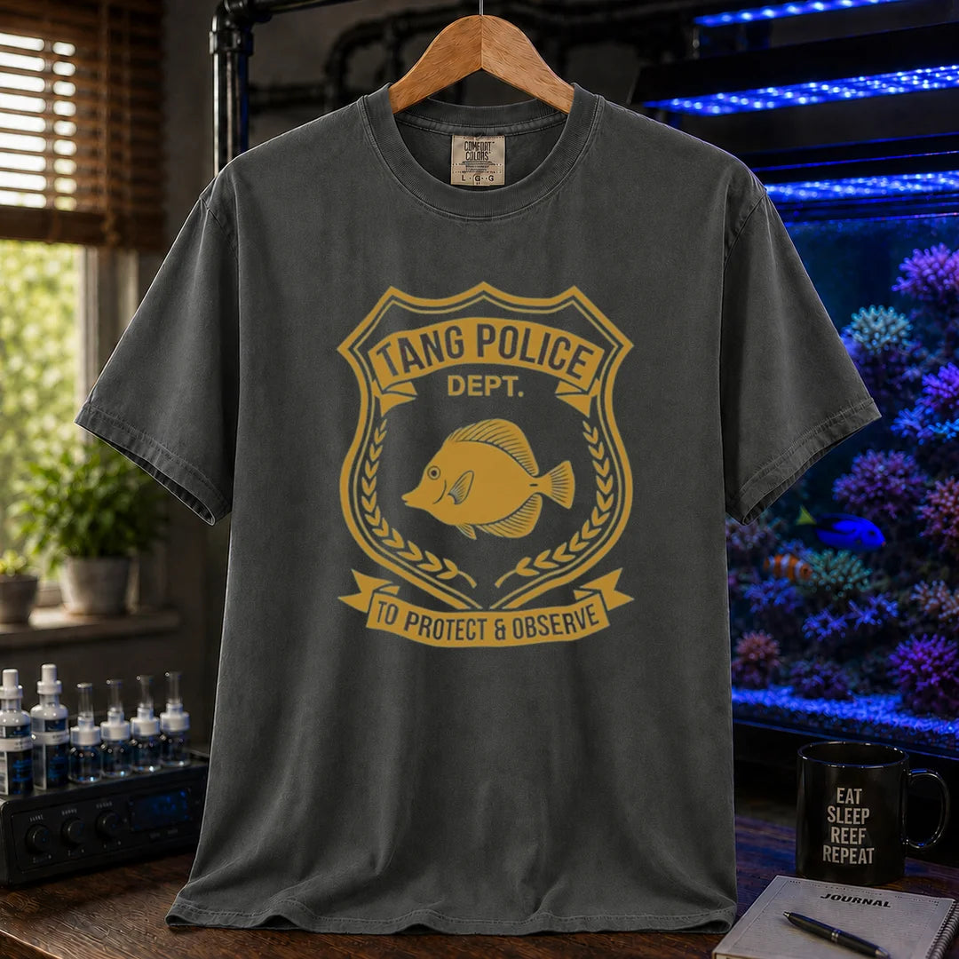 Saltwater aquarium graphic t-shirt featuring a gold police badge with a tang fish and text: TANG POLICE DEPT. TO PROTECT & OBSERVE, dark grey crew neck tee