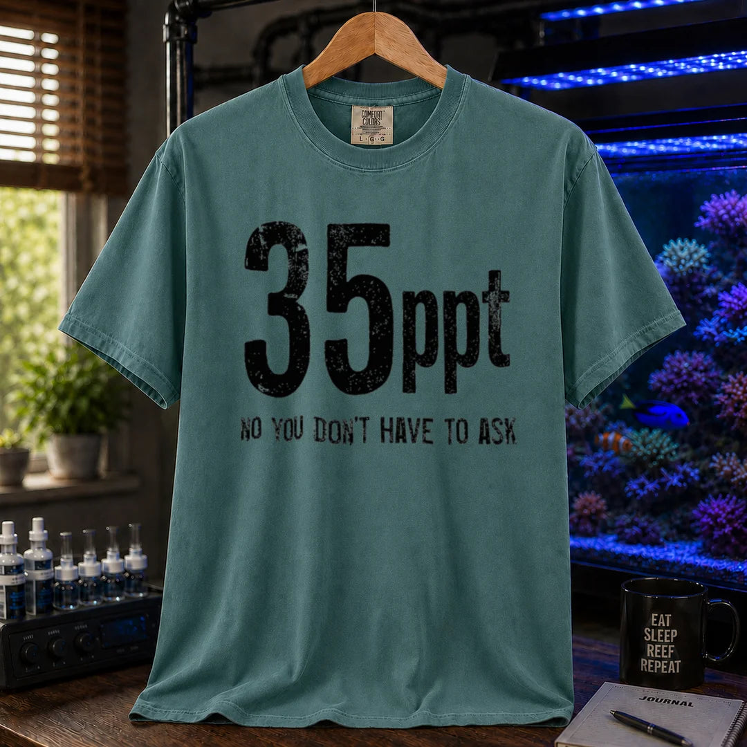 Saltwater aquarium graphic t-shirt featuring bold distressed text: 35ppt NO YOU DON'T HAVE TO ASK, green crew neck tee