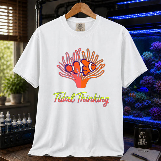 Saltwater aquarium graphic t-shirt featuring a clownfish in an anemone and cursive text: Tidal Thinking, white crew neck tee