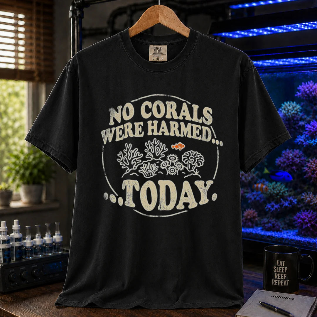 Saltwater aquarium graphic t-shirt featuring a circular badge with corals and text: NO CORALS WERE HARMED... TODAY., black crew neck tee