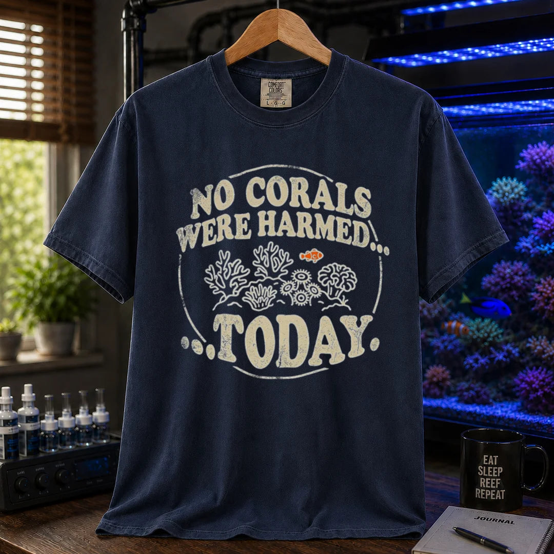 Saltwater aquarium graphic t-shirt featuring a circular badge with corals and text: NO CORALS WERE HARMED... TODAY., navy crew neck tee