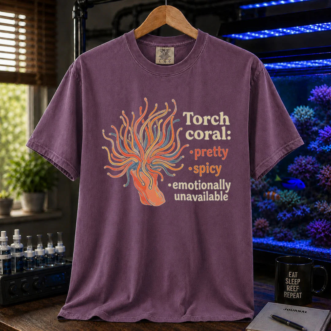 Saltwater aquarium graphic t-shirt featuring a torch coral illustration and text: Torch coral: • pretty • spicy • emotionally unavailable, purple crew neck tee