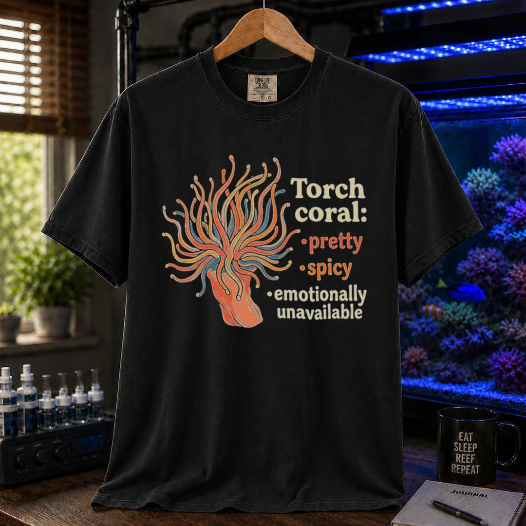 Saltwater aquarium graphic t-shirt featuring a torch coral illustration and text: Torch coral: • pretty • spicy • emotionally unavailable, black crew neck tee