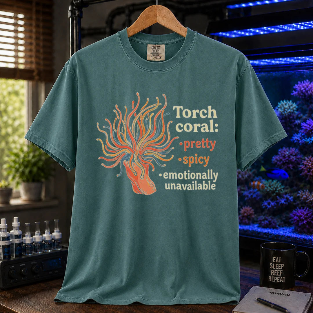 Saltwater aquarium graphic t-shirt featuring a torch coral illustration and text: Torch coral: • pretty • spicy • emotionally unavailable, green crew neck tee