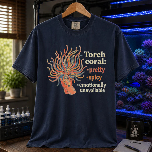 Saltwater aquarium graphic t-shirt featuring a torch coral illustration and text: Torch coral: • pretty • spicy • emotionally unavailable, navy crew neck tee