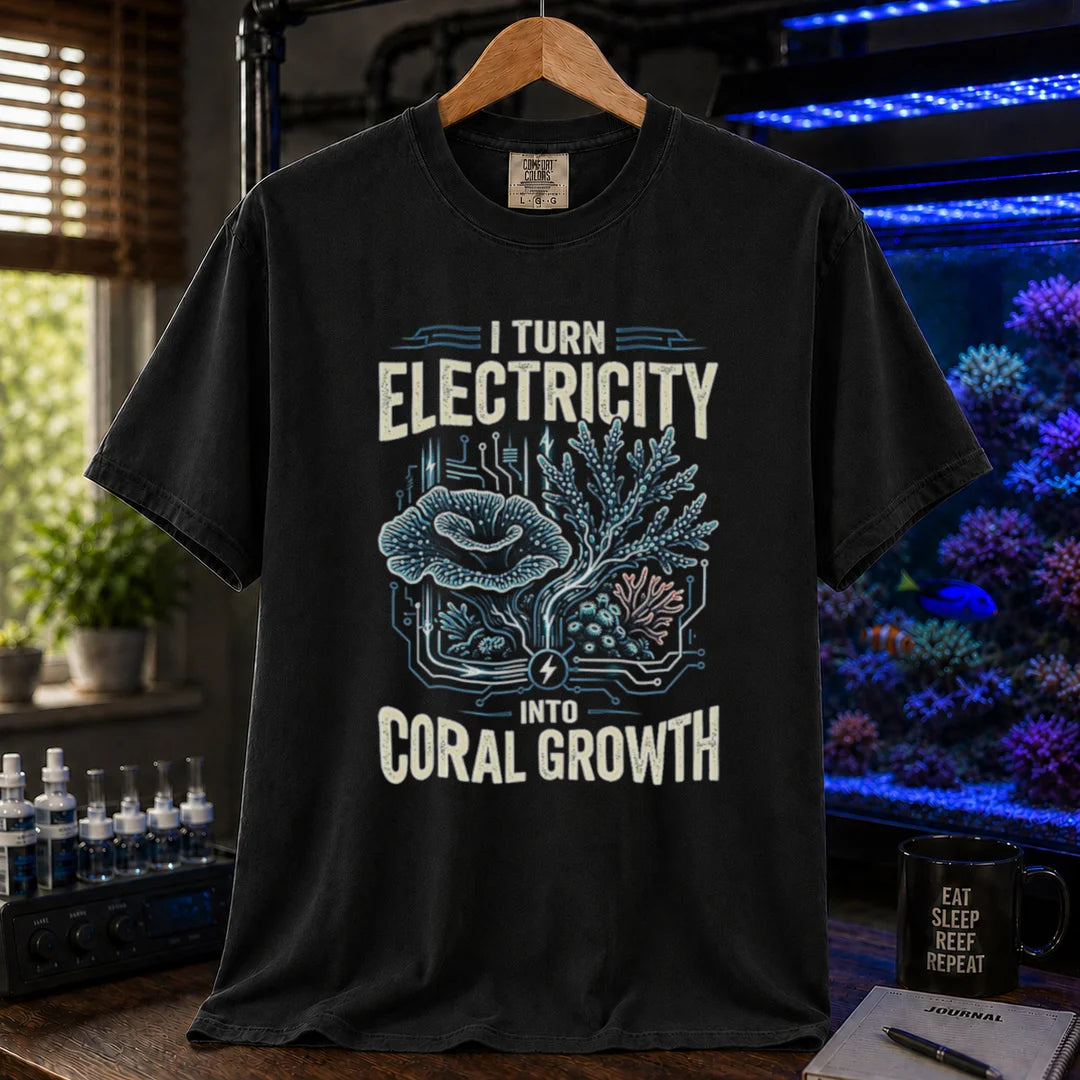 Saltwater aquarium graphic t-shirt featuring circuit board patterns mixed with corals and text: I TURN ELECTRICITY INTO CORAL GROWTH, black crew neck tee