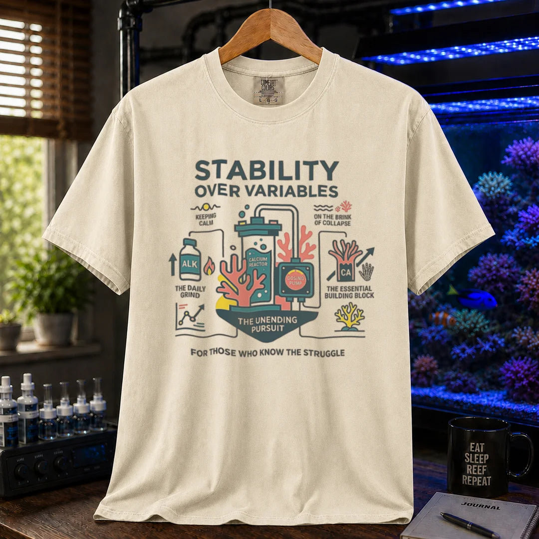 Saltwater aquarium graphic t-shirt featuring a detailed technical diagram with coral and text: STABILITY OVER VARIABLES FOR THOSE WHO KNOW THE STRUGGLE, cream, beige, ivory crew neck tee