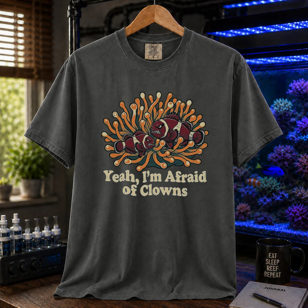 Saltwater aquarium graphic t-shirt featuring an illustration of angry clownfish in an anemone with text reading Yeah, I'm Afraid of Clowns, dark grey crew neck tee