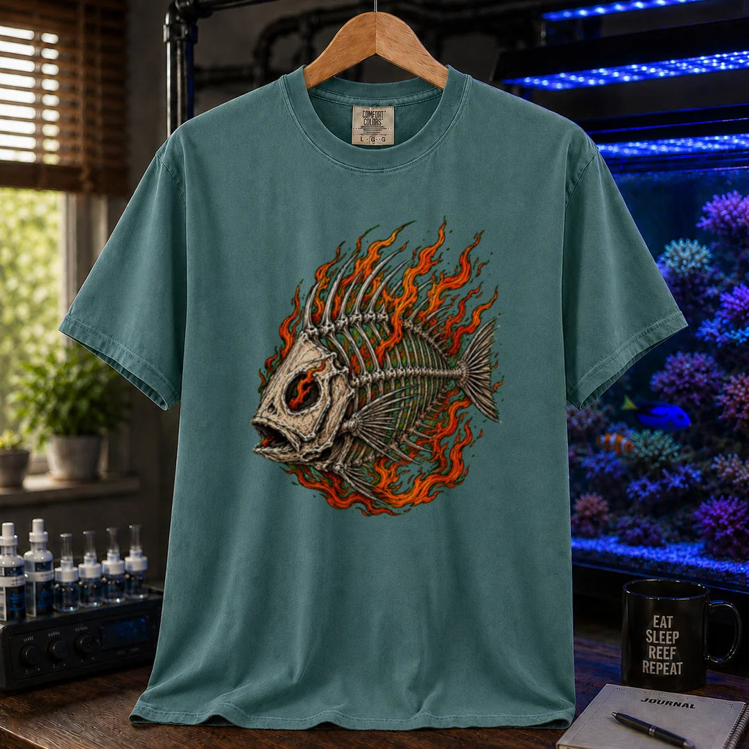 Saltwater aquarium graphic t-shirt featuring an illustration of a fish skeleton wrapped in flames, green crew neck tee