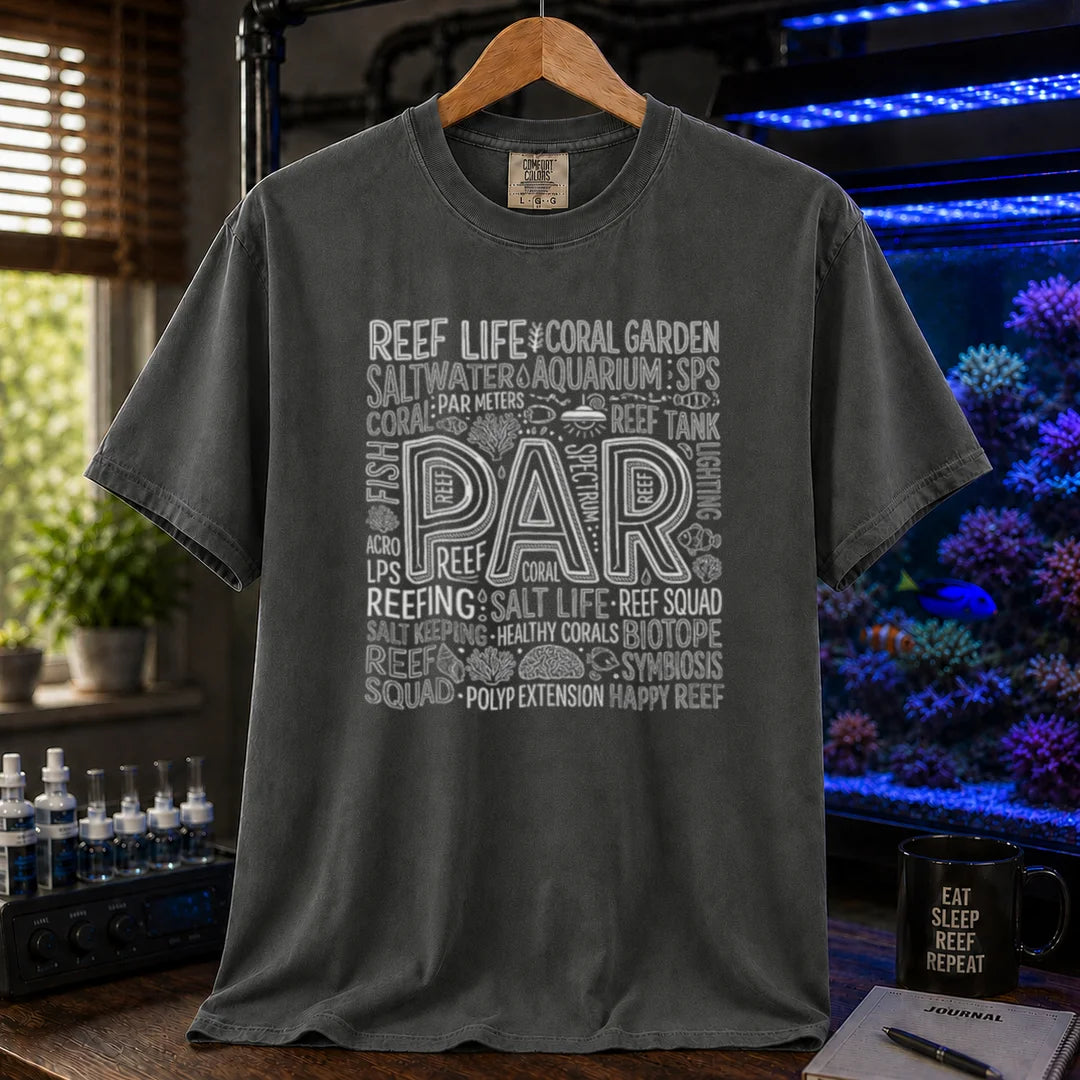 Saltwater aquarium graphic t-shirt featuring a typography collage centered around the word PAR with reef terminology on a dark grey crew neck tee