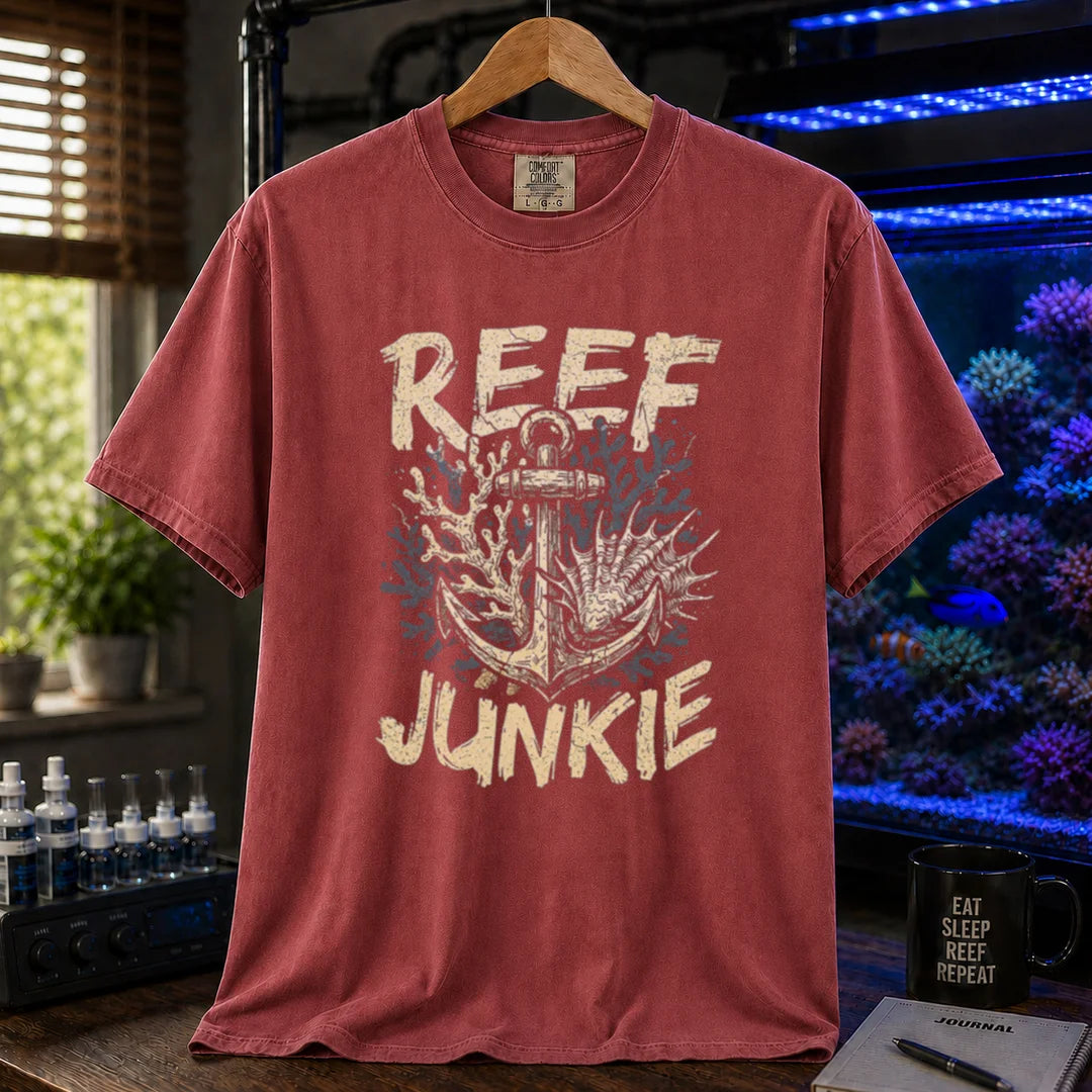Saltwater aquarium graphic t-shirt featuring an anchor tangled in coral and shells with the text REEF JUNKIE,  maroon, red crew neck tee