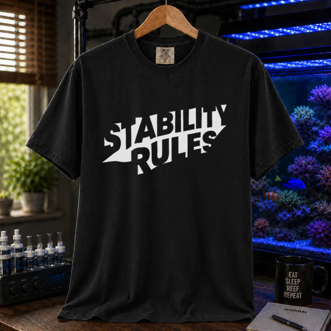 Saltwater aquarium graphic t-shirt featuring bold slanted block text reading STABILITY RULES, black crew neck tee
