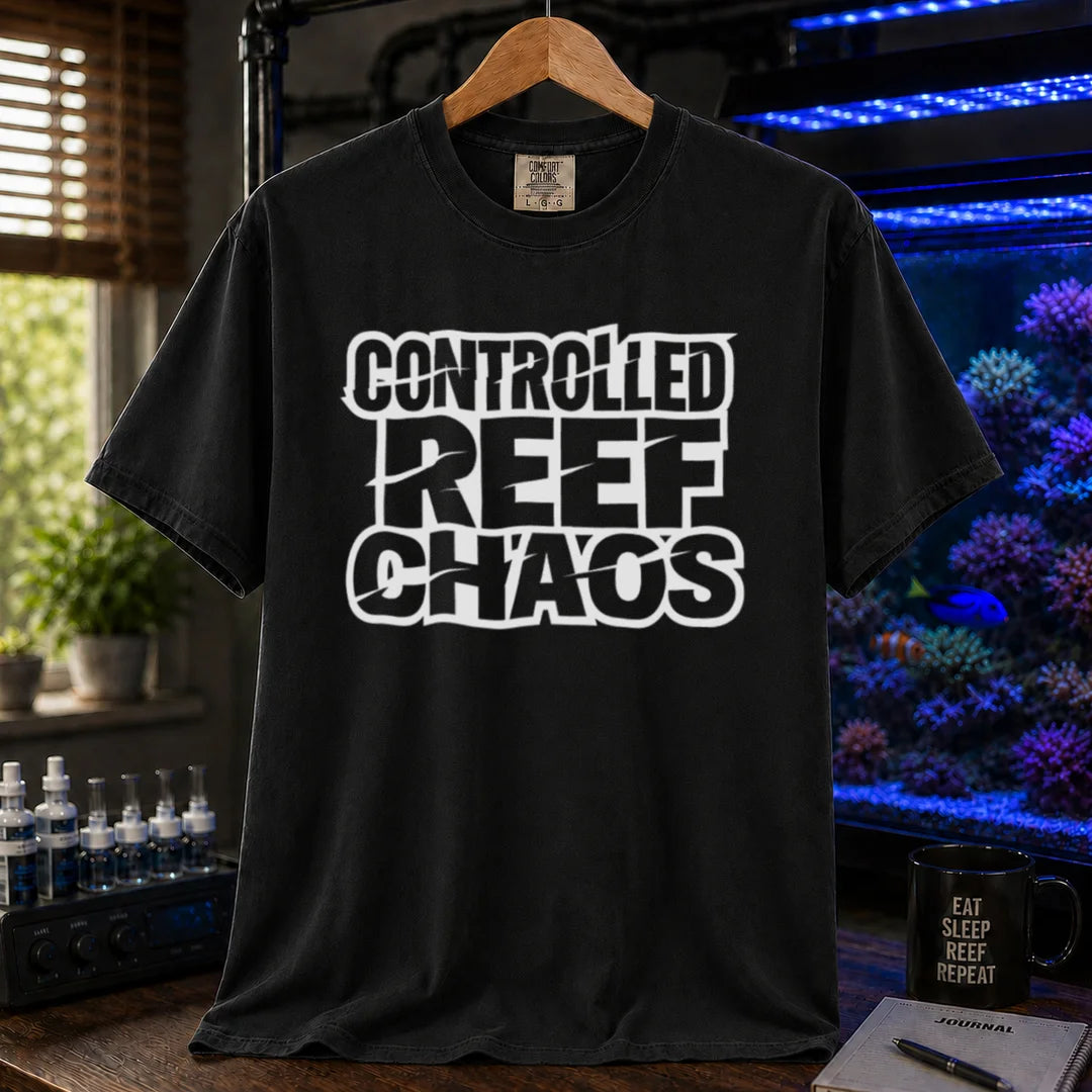 Saltwater aquarium graphic t-shirt featuring bold distressed block text reading CONTROLLED REEF CHAOS, black crew neck tee