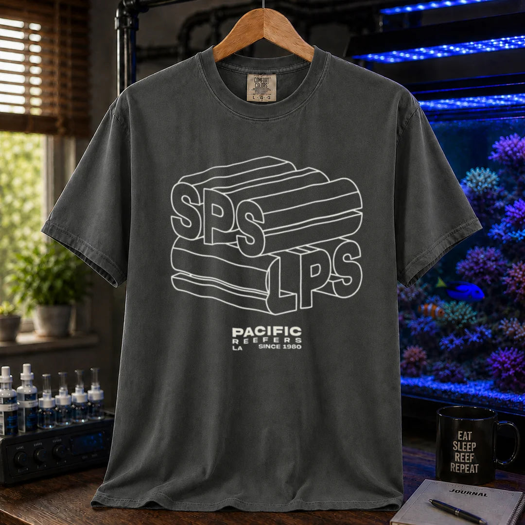 Saltwater aquarium graphic t-shirt featuring 3D extruded typography reading SPS and LPS above PACIFIC REEFERS LA SINCE 1980, dark grey crew neck tee