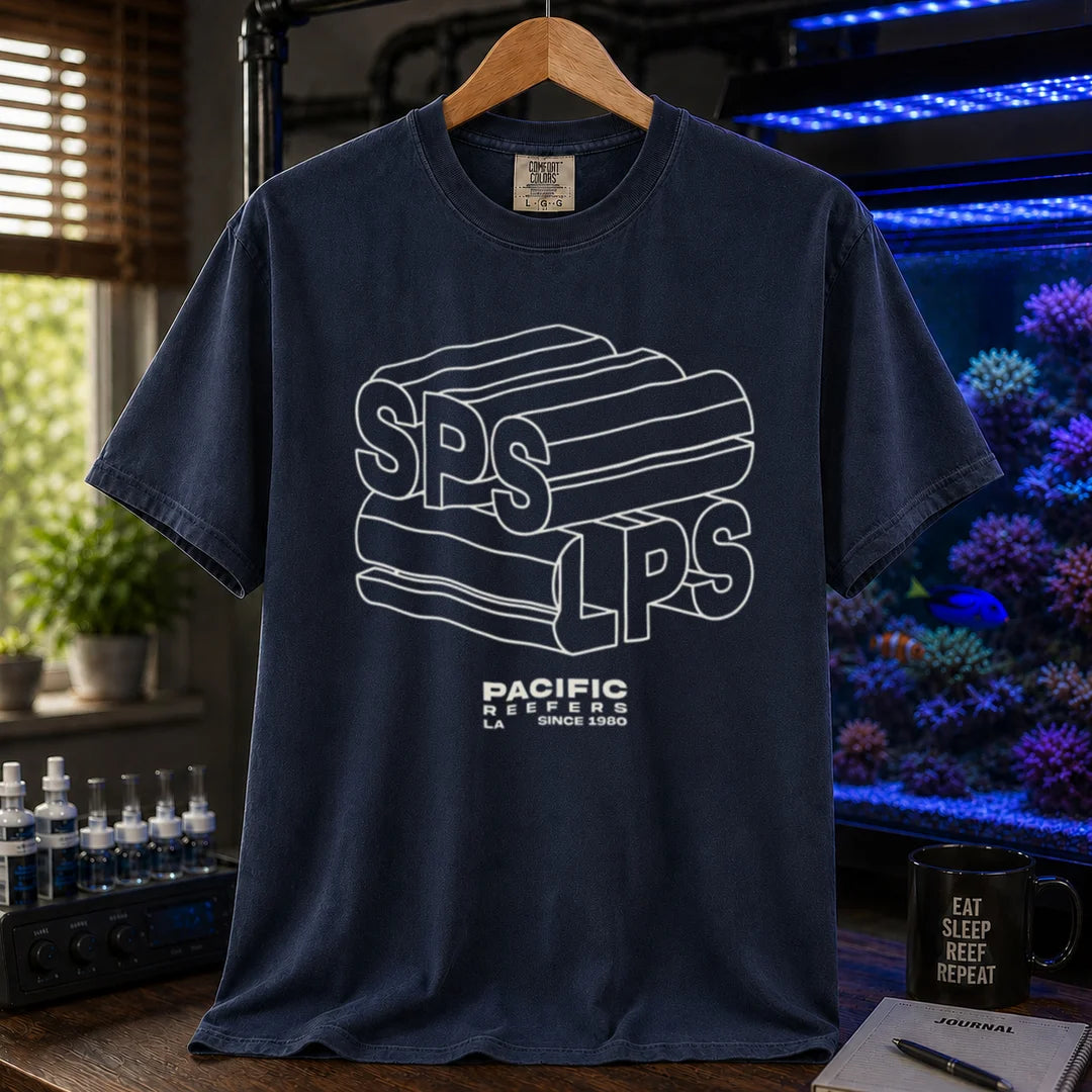 Saltwater aquarium graphic t-shirt featuring 3D extruded typography reading SPS and LPS above PACIFIC REEFERS LA SINCE 1980, navy crew neck tee