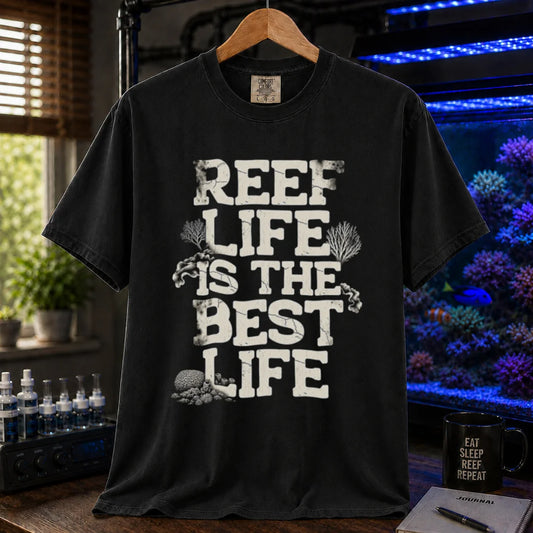 Saltwater aquarium graphic t-shirt featuring distressed white block text reading REEF LIFE IS THE BEST LIFE framed with coral illustrations, black crew neck tee