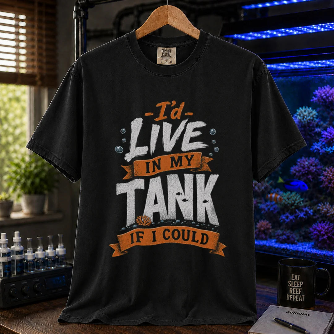 Saltwater aquarium graphic t-shirt featuring orange and white typography reading I'd Live In My Tank If I Could with bubbles and fish accents, black crew neck tee