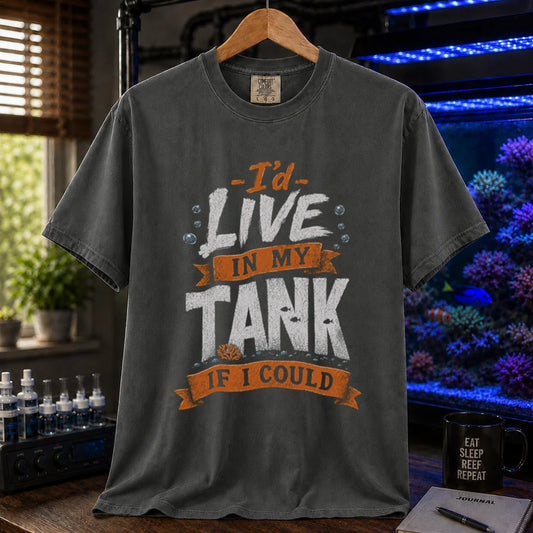 Saltwater aquarium graphic t-shirt featuring orange and white typography reading I'd Live In My Tank If I Could with bubbles and fish accents, dark grey crew neck tee