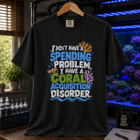 Saltwater aquarium graphic t-shirt featuring colorful distressed text reading I Don't Have A Spending Problem, I Have A Coral Acquisition Disorder with a clownfish and coral accents, black crew neck tee