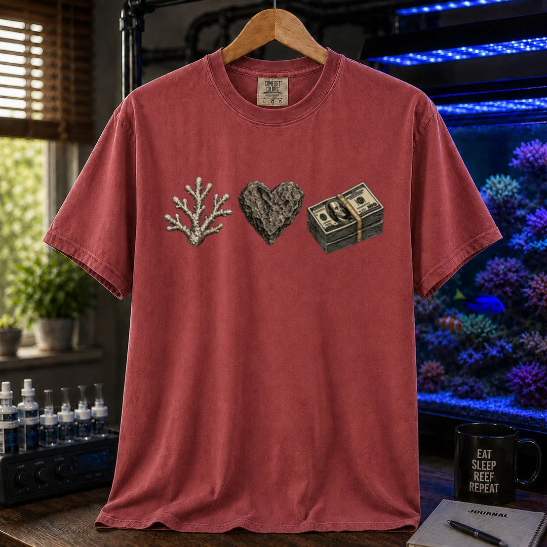 Saltwater aquarium graphic t-shirt featuring line art of a coral branch, a heart-shaped rock, and a stack of hundred dollar bills, maroon, red crew neck tee
