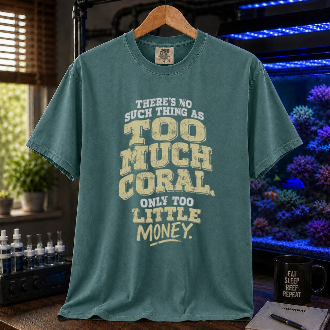 Saltwater aquarium graphic t-shirt featuring distressed cream and white typography reading There's No Such Thing As Too Much Coral. Only Too Little Money., green crew neck tee