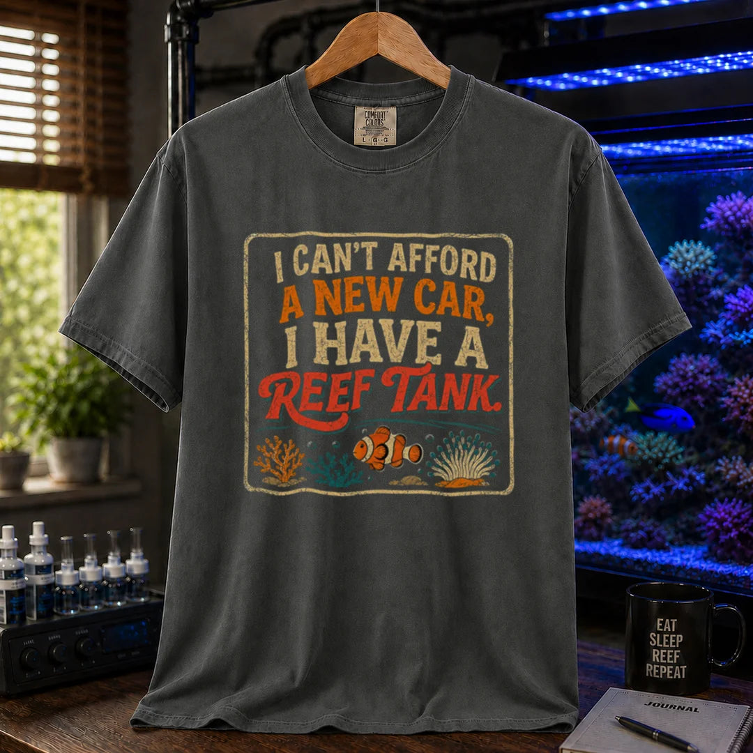 Saltwater aquarium graphic t-shirt featuring a vintage square design with text reading I Can't Afford a New Car, I Have a Reef Tank and a clownfish illustration, dark grey crew neck tee