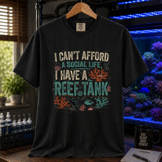 Saltwater aquarium graphic t-shirt featuring a vintage square design with text reading I Can't Afford a Social Life, I Have a Reef Tank and coral illustrations, black crew neck tee