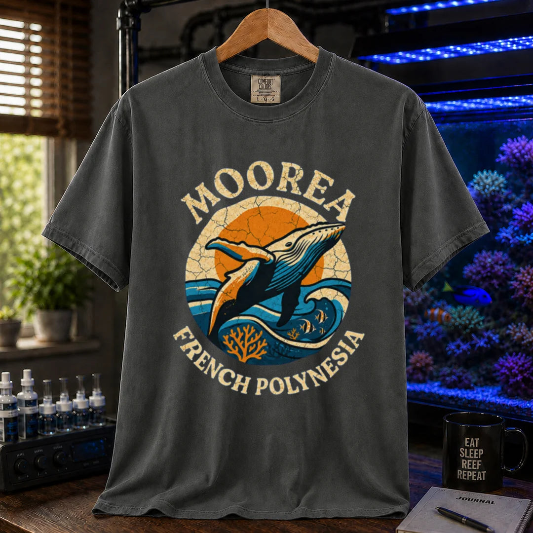 Saltwater aquarium graphic t-shirt featuring a retro circular emblem with a breaching whale and coral, arched text reading Moorea French Polynesia, dark grey crew neck tee