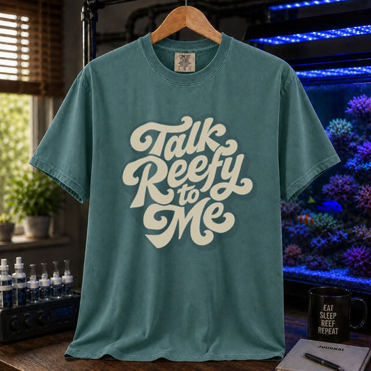 Saltwater aquarium graphic t-shirt featuring smooth retro cream script typography reading Talk Reefy to Me, green crew neck tee