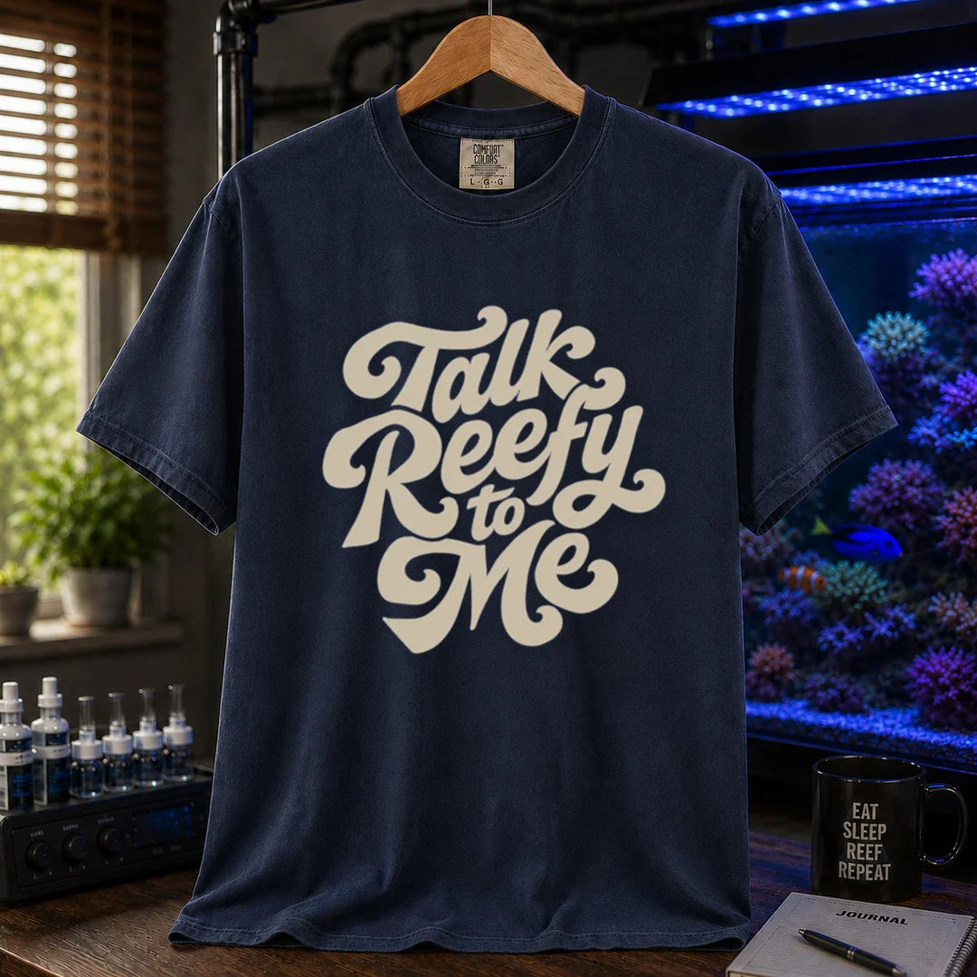 Saltwater aquarium graphic t-shirt featuring smooth retro cream script typography reading Talk Reefy to Me, navy crew neck tee