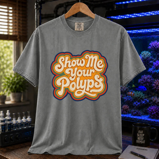 Saltwater aquarium graphic t-shirt featuring retro multi-layered stacked typography in cream, yellow, and orange reading Show Me Your Polyps, grey crew neck tee