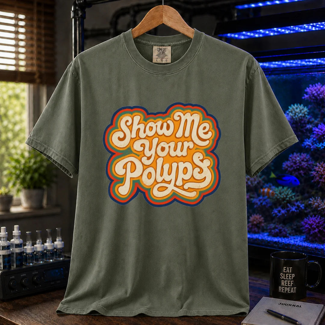 Saltwater aquarium graphic t-shirt featuring retro multi-layered stacked typography in cream, yellow, and orange reading Show Me Your Polyps, military green crew neck tee