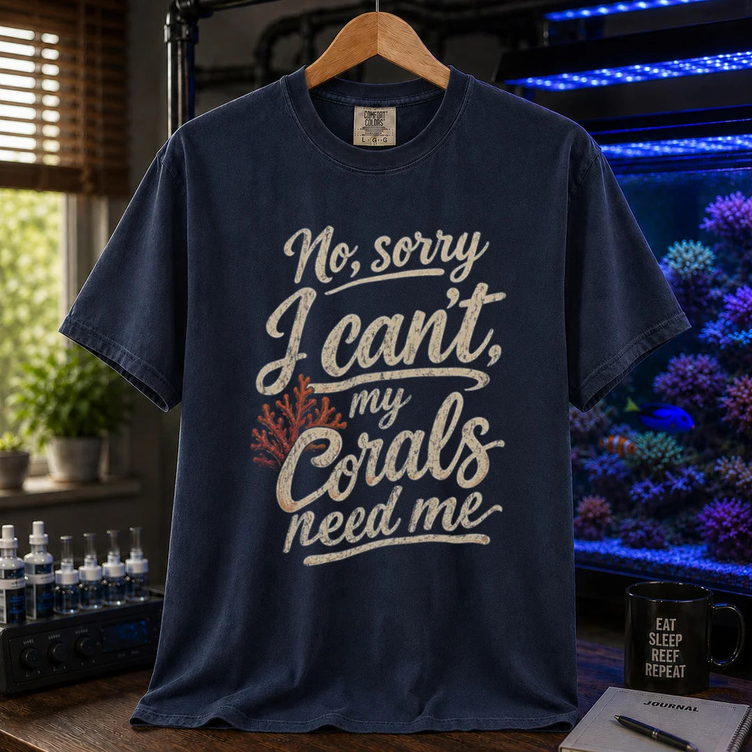 Saltwater aquarium graphic t-shirt featuring distressed cream script typography and a red coral graphic reading No, sorry I can't, my corals need me, navy crew neck tee