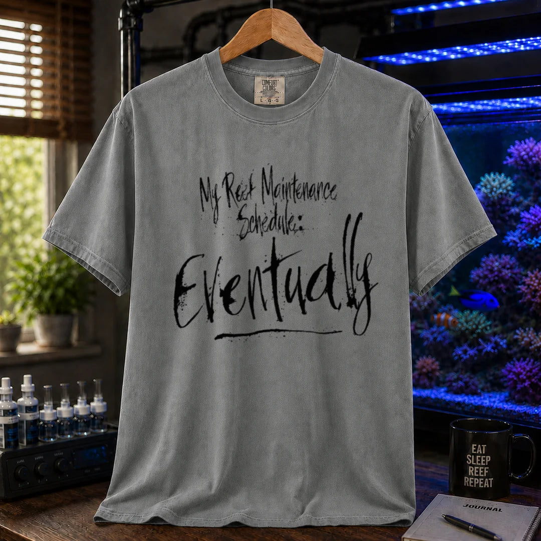 Saltwater aquarium graphic t-shirt featuring grunge brushstroke typography reading My Reef Maintenance Schedule: Eventually, grey crew neck tee