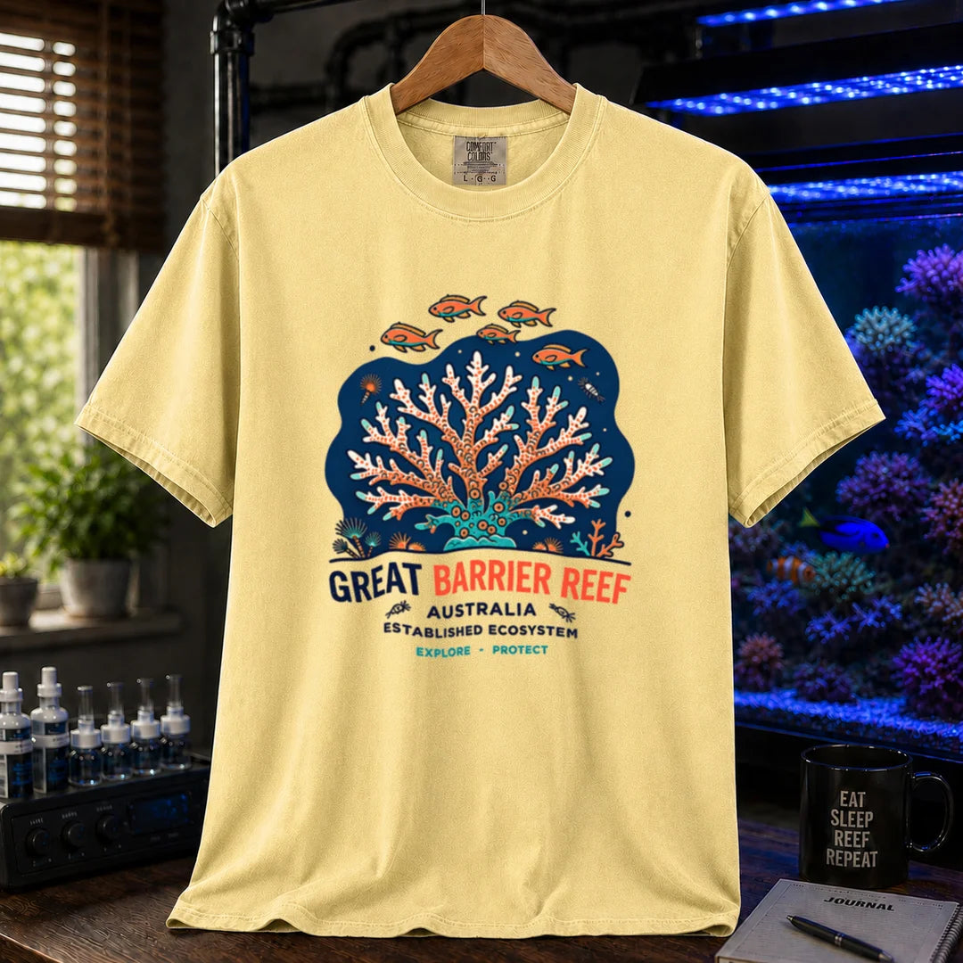 Saltwater aquarium graphic t-shirt featuring an illustration of a coral colony and fish with text reading Great Barrier Reef Australia Established Ecosystem Explore Protect, yellow crew neck tee