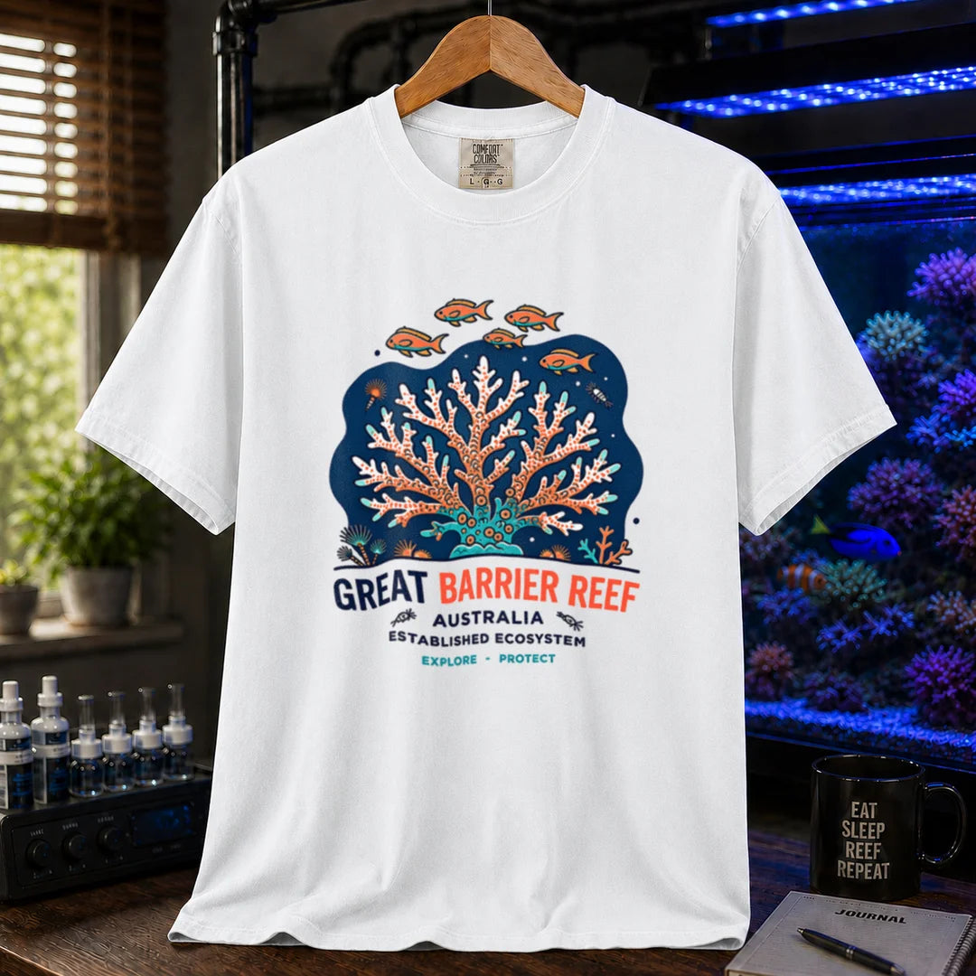 Saltwater aquarium graphic t-shirt featuring an illustration of a coral colony and fish with text reading Great Barrier Reef Australia Established Ecosystem Explore Protect, white crew neck tee