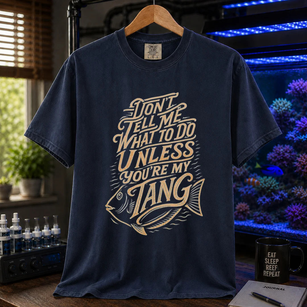 Saltwater aquarium graphic t-shirt featuring distressed cream typography and a tang fish illustration reading Don't Tell Me What To Do Unless You're My Tang, navy crew neck tee