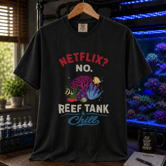 Saltwater aquarium graphic t-shirt featuring red and white typography reading Netflix? No. Reef Tank & Chill with a colorful coral and fish illustration, black crew neck tee