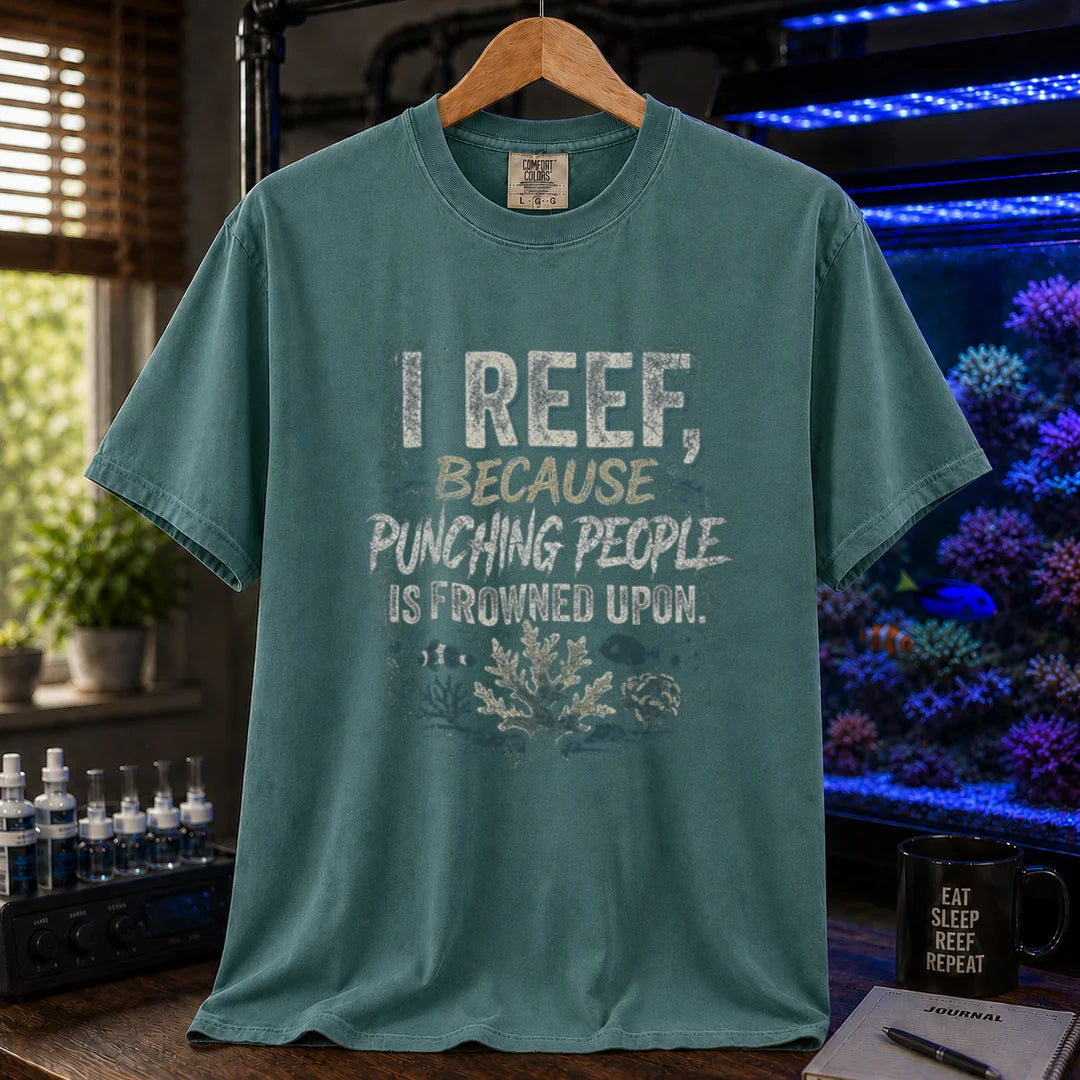 Saltwater aquarium graphic t-shirt featuring distressed typography reading I Reef, Because Punching People Is Frowned Upon with coral and fish graphics, green crew neck tee