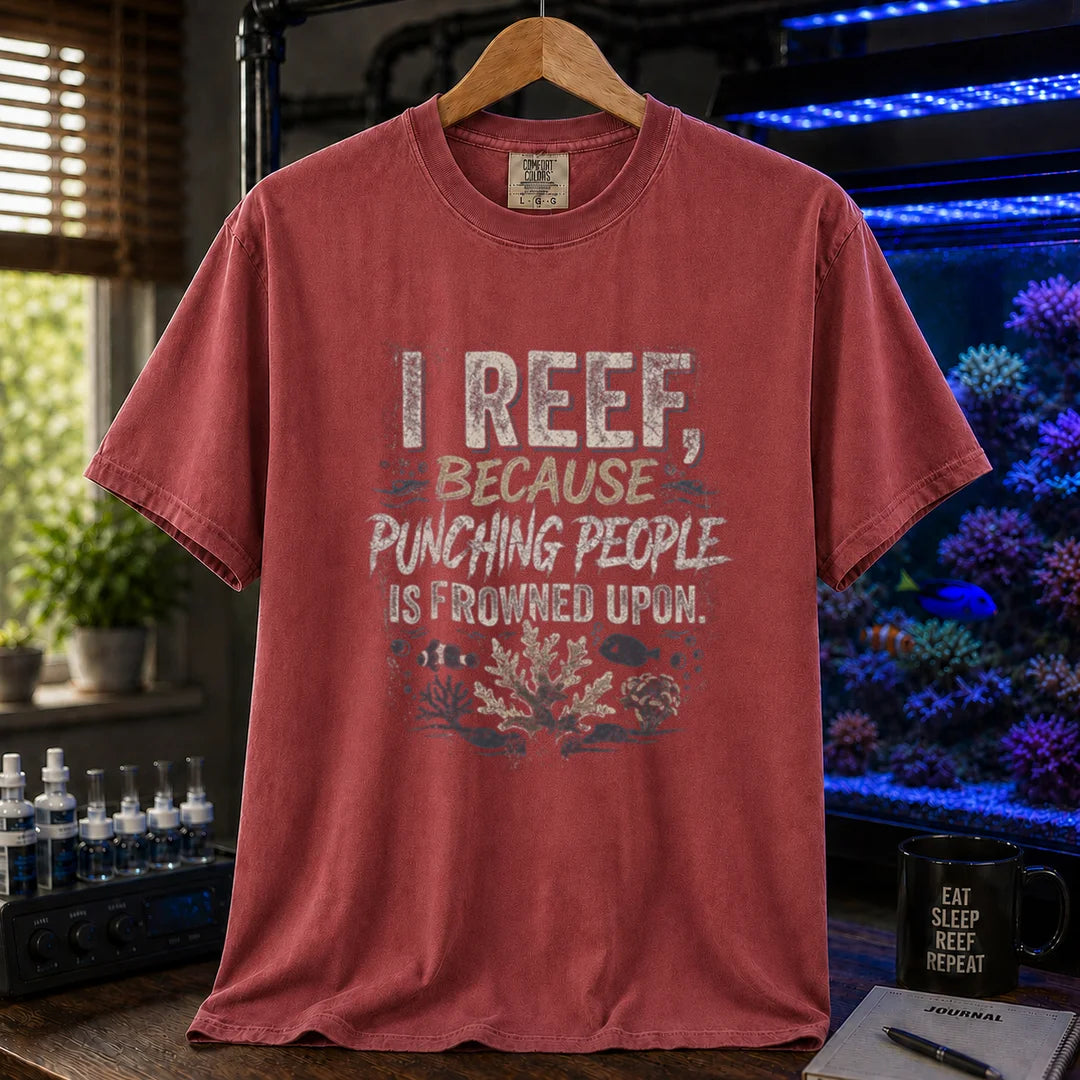Saltwater aquarium graphic t-shirt featuring distressed typography reading I Reef, Because Punching People Is Frowned Upon with coral and fish graphics, maroon, red crew neck tee