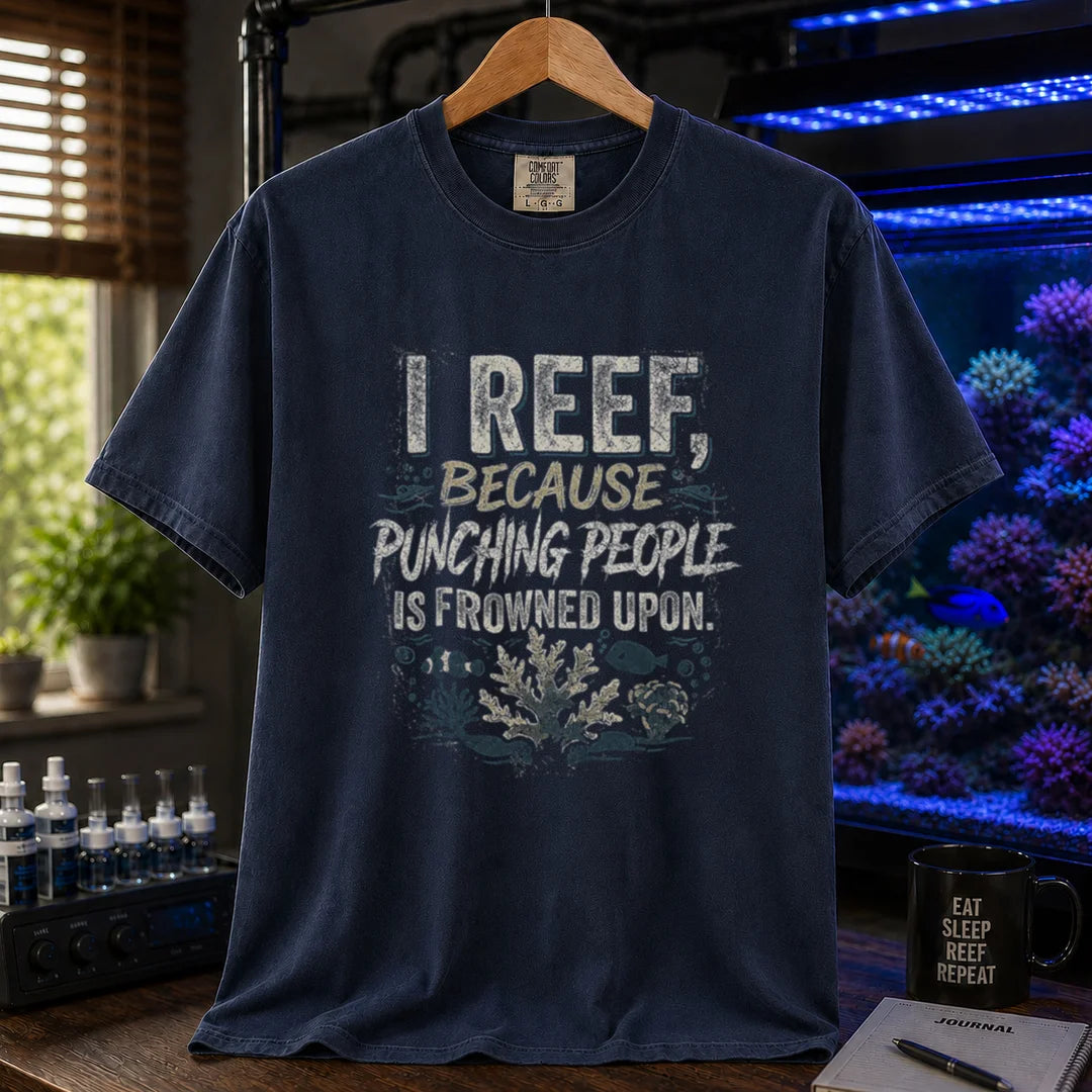 Saltwater aquarium graphic t-shirt featuring distressed typography reading I Reef, Because Punching People Is Frowned Upon with coral and fish graphics, navy crew neck tee