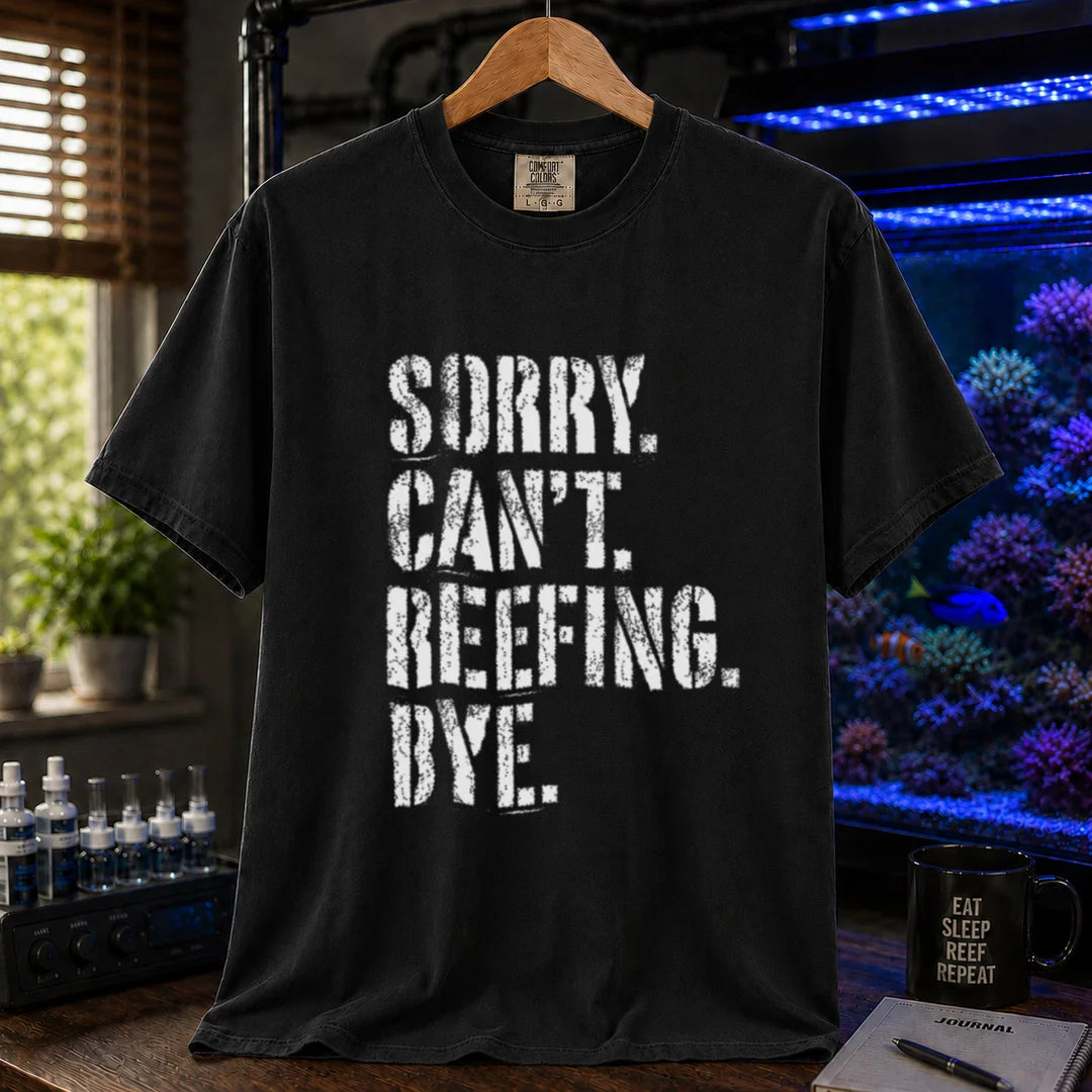 Saltwater aquarium graphic t-shirt featuring distressed white typography reading Sorry. Can't. Reefing. Bye., black crew neck tee