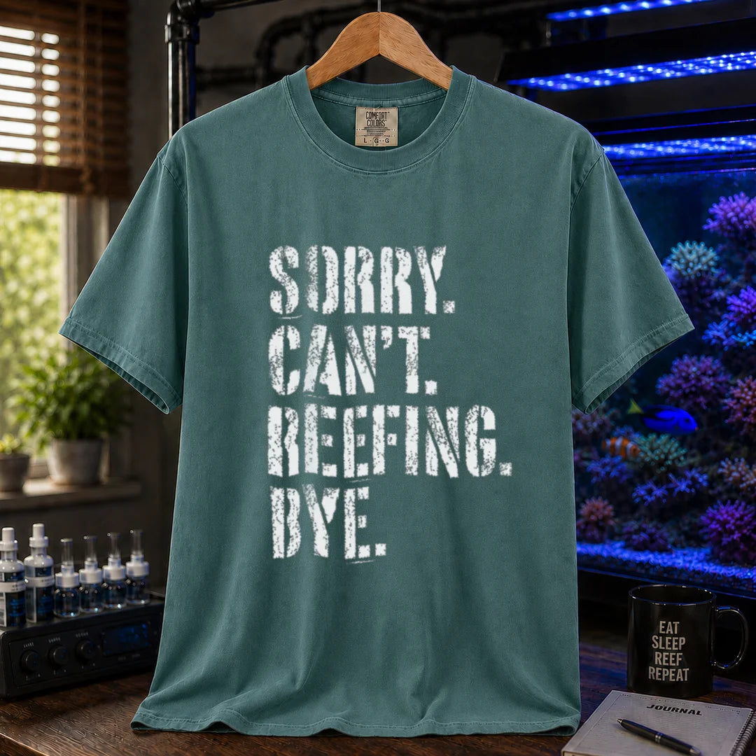 Saltwater aquarium graphic t-shirt featuring distressed white typography reading Sorry. Can't. Reefing. Bye., green crew neck tee