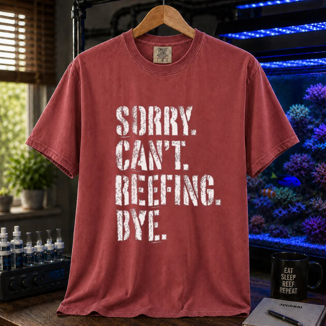 Saltwater aquarium graphic t-shirt featuring distressed white typography reading Sorry. Can't. Reefing. Bye., maroon, red crew neck tee