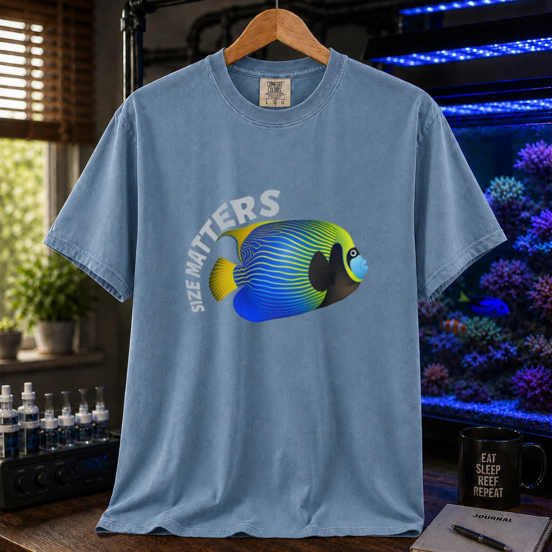 Saltwater aquarium graphic t-shirt featuring arched white typography reading Size Matters with an illustrated Emperor Angelfish, blue crew neck tee