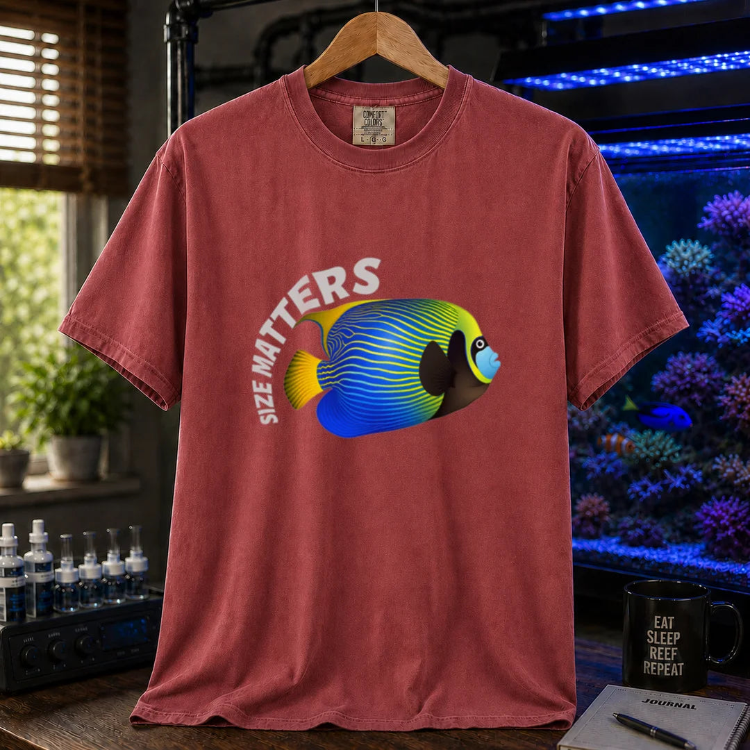 Saltwater aquarium graphic t-shirt featuring arched white typography reading Size Matters with an illustrated Emperor Angelfish, maroon, red crew neck tee