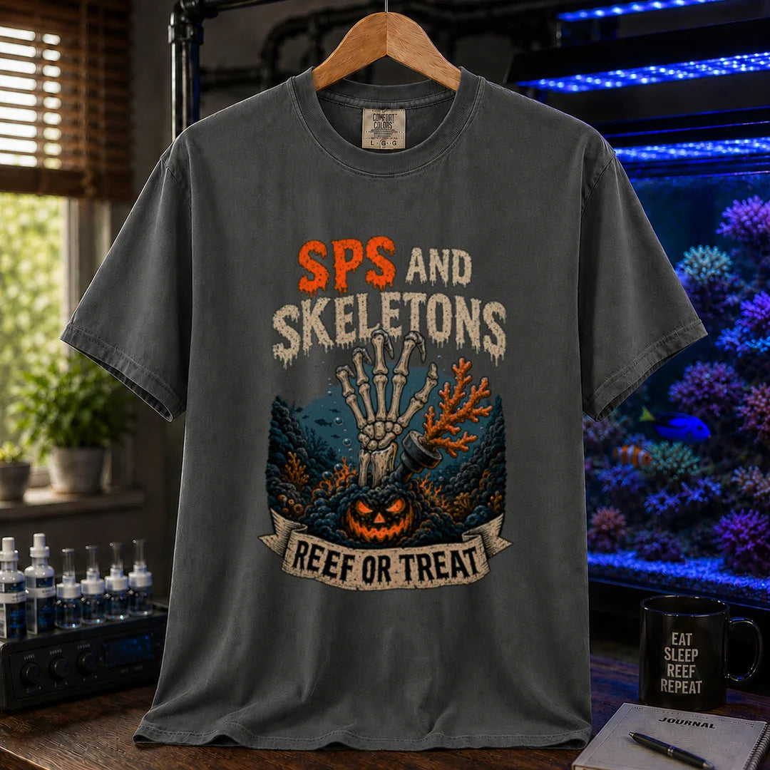 Saltwater aquarium graphic t-shirt featuring orange and white distressed typography reading SPS And Skeletons with an underwater jack-o'-lantern, skeletal hand, and a banner reading Reef Or Treat, dark grey crew neck tee